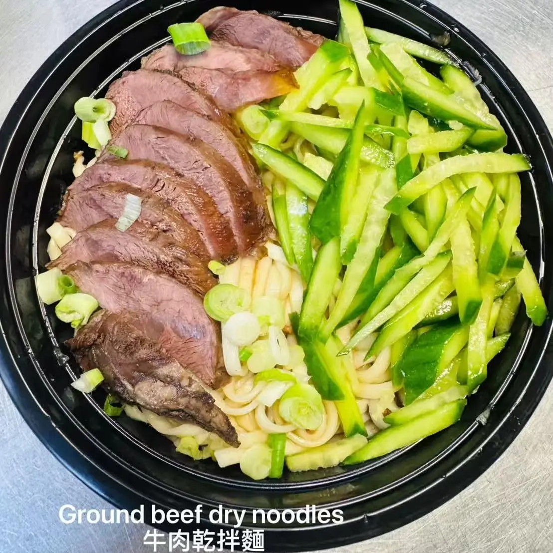 Ground beef dry noodles with cucumber strips at Mango Island, a Chinese Taiwanese Restaurant in Orlando